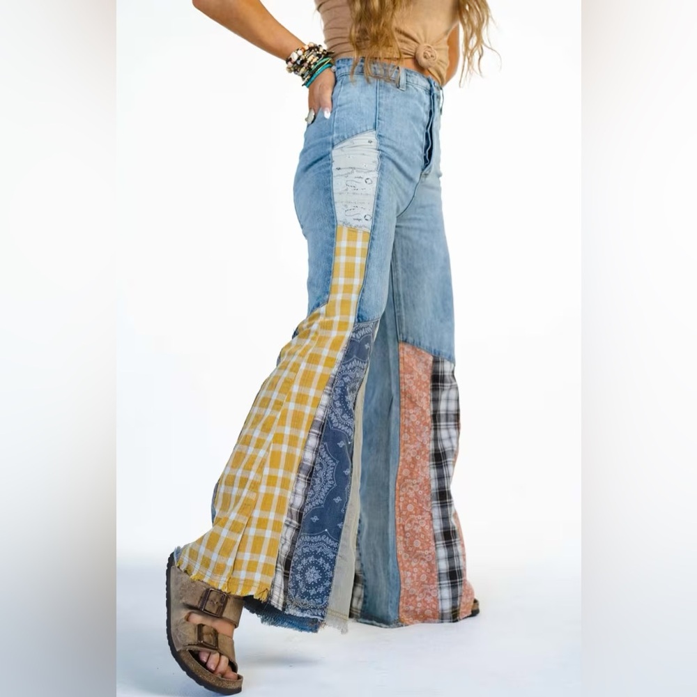 Easel wide leg bell bottom patch work light blue denim jean. Runs small.